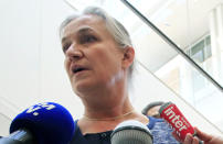 Doctor Irene Frachon, who discovered that the drug Mediator could have fatal side effect, speaks to reporters as she arrived at Paris courthouse Monday, Sept. 23, 2019. A massive trial with more than 4,000 plaintiffs is opening for French pharmaceutical giant Servier Laboratoires and France's medicines watchdog. (AP Photo/Michel Euler)