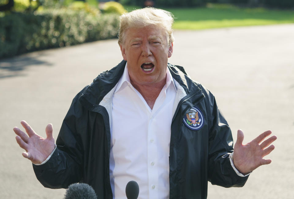 President Trump talks to the media before boarding Marine One on the South Lawn of the White House in Washington, D.C., on Wednesday. (Photo: Carolyn Kaster/AP)