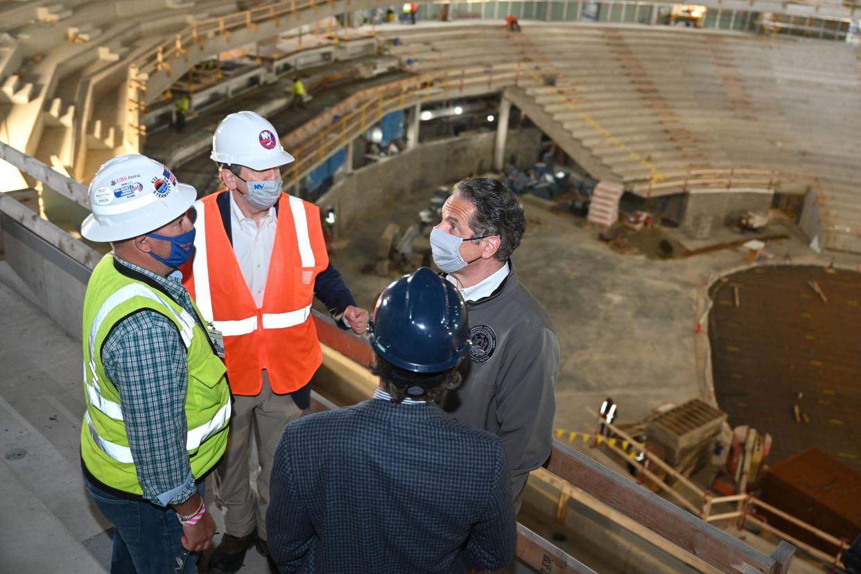 Governor Andrew Cuomo, joined by Executive Vice-President of Sterling Equities Jeff Wilpon, senior project manager Anthony Lopez, also of Sterling Equities, and New York Islanders Owner Jon Ledecky, tours the new UBS Arena under construction at Belmont Park in Elmont Wednesday, April 14. 