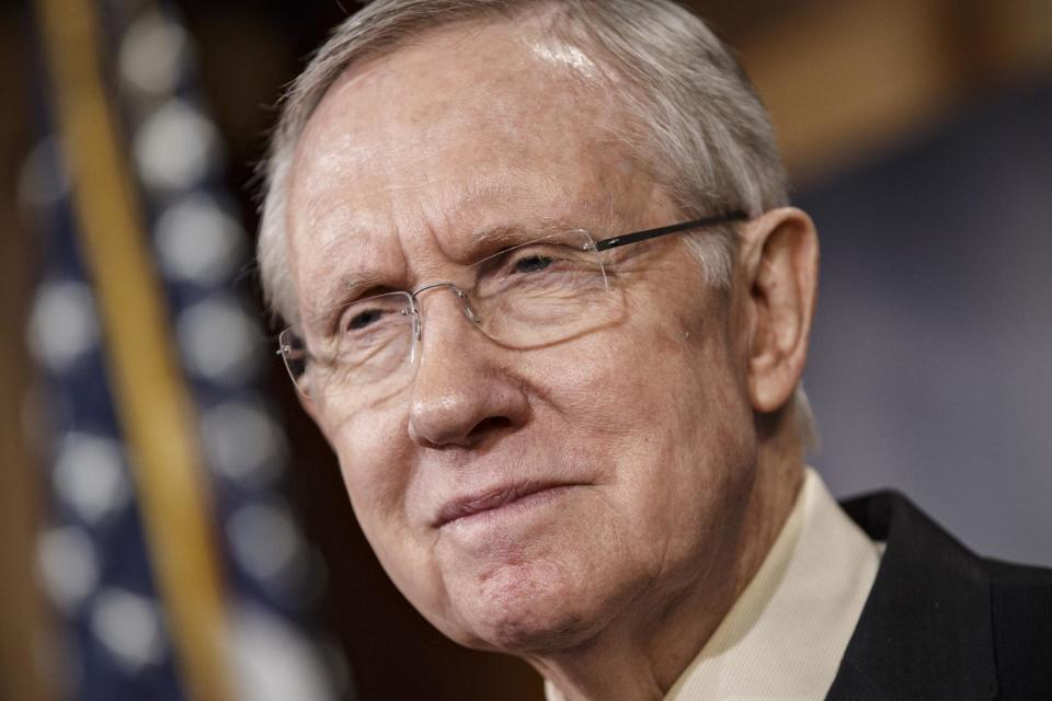 Senate Majority Leader Harry Reid, D-Nev., meets with reporters to urge passage of legislation to restore unemployment insurance benefits which expired Dec. 28, at the Capitol in Washington, Thursday, Jan. 9, 2014. (AP Photo/J. Scott Applewhite)