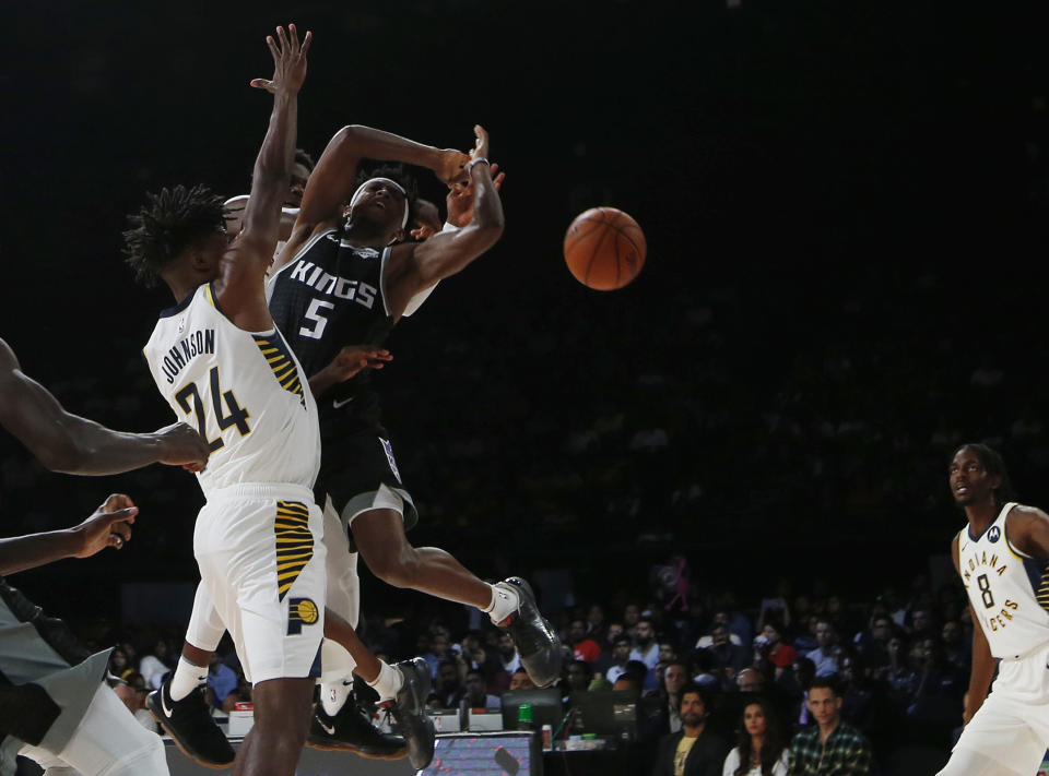 Sacramento Kings player De' Aaron Fox plays against Indiana Pacers during the NBA India Games 2019, in Mumbai, India, Saturday, Oct. 5, 2019. (AP Photo/Rajanish Kakade)