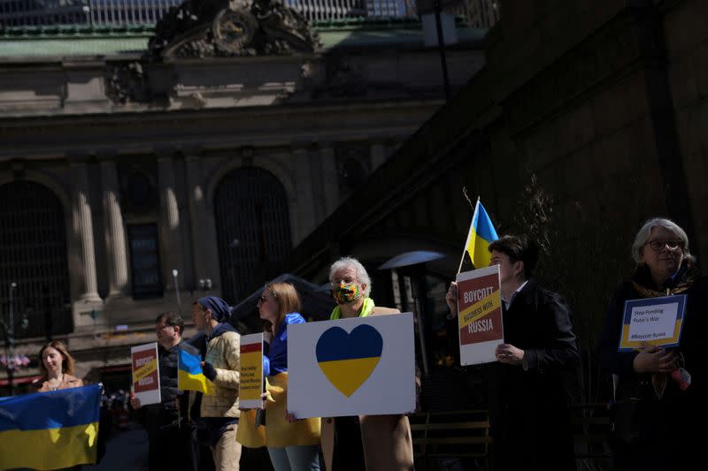 FILE PHOTO: Demonstration by supporters of Ukraine against Philip Morris International Inc continued business in Russia during protest in Manhattan, New York City