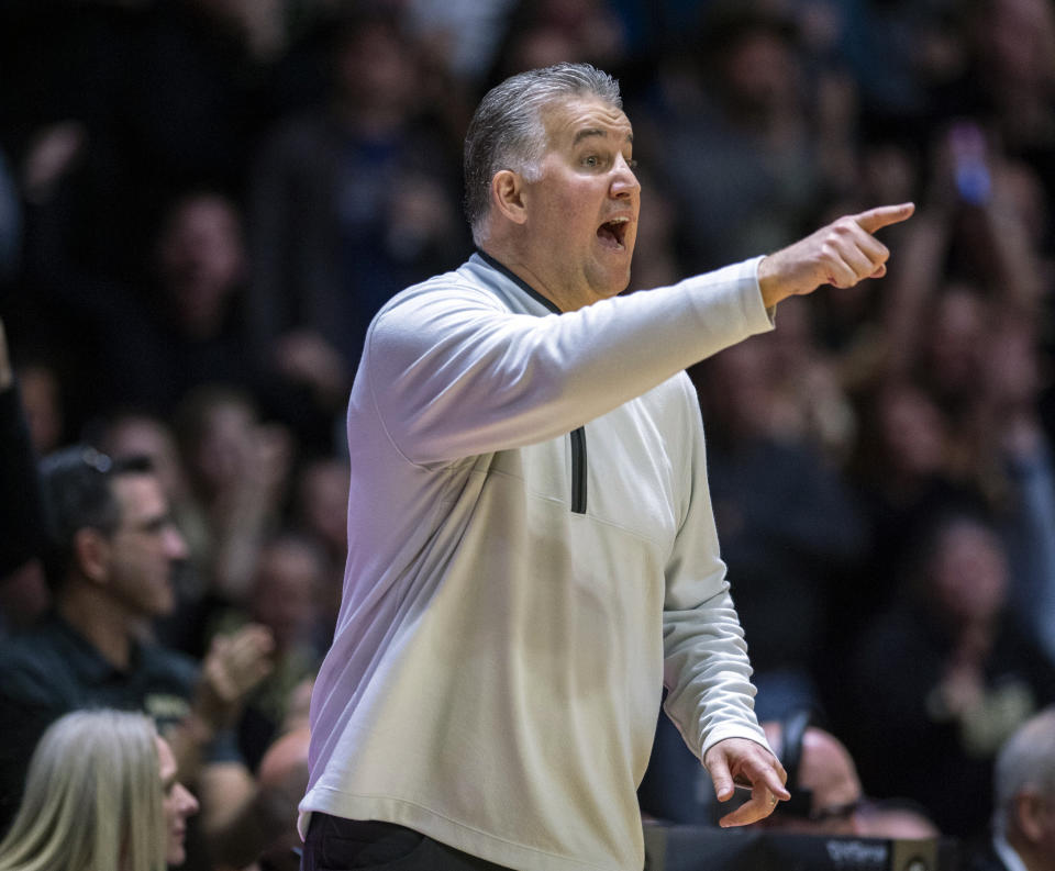 Purdue head coach Matt Painter gestures during the first half of an NCAA college basketball game against Indiana, Saturday, March 5, 2022, in West Lafayette, Ind. (AP Photo/Doug McSchooler)