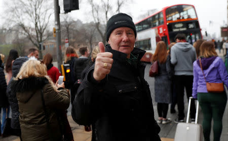 Scottish author Irvine Welsh gestures as he leaves an interview with Reuters ahead of the premiere of the film "T2 Trainspotting" in Edinburgh January 22, 2017. REUTERS/Russell Cheyne