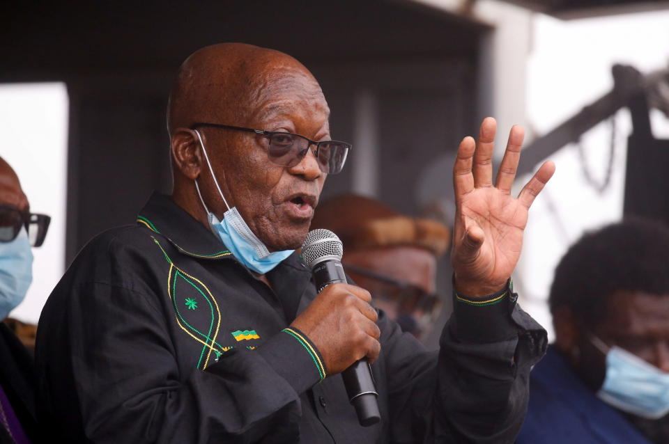 Former South African president Jacob Zuma speaks to supporters who gathered at his home, as South African court agreed to hear his challenge to a 15-month jail term for failing to attend a corruption hearing, in Nkandla, South Africa, July 4, 2021. REUTERS/Rogan Ward