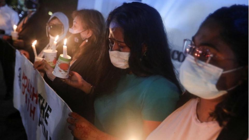 Angelia Pranthaman, sister of Pannir Selvam Pranthaman, a Malaysian drug trafficker facing death sentence, cries at a vigil for Nagaenthran Dharmalingam