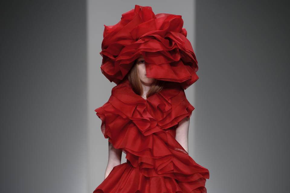 A model wears a design created by John Rocha during London Fashion Week Autumn/Winter 2014, at Somerset House in central London, Saturday, Feb. 15, 2014. (Photo by Jonathan Short/Invision/AP)