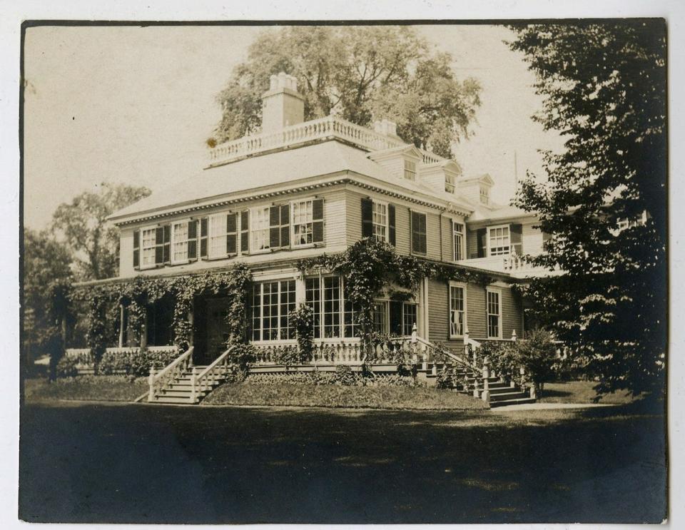 This is a photo of the Longfellow House–Washington’s Headquarters as it appeared around 1910. The house shares many characteristics with Monroe’s Johnson-Phinney House. Henry Wadsworth Longfellow died in 1882, and his family established the Longfellow House Trust in 1913 to preserve the home and its view of the Charles River.