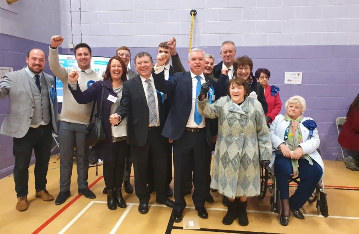 Katie Fieldhouse (top right with pink jacket) looks unimpressed as Mark Menzies celebrates his emphatic election victory in 2019  (Mark Menzies)