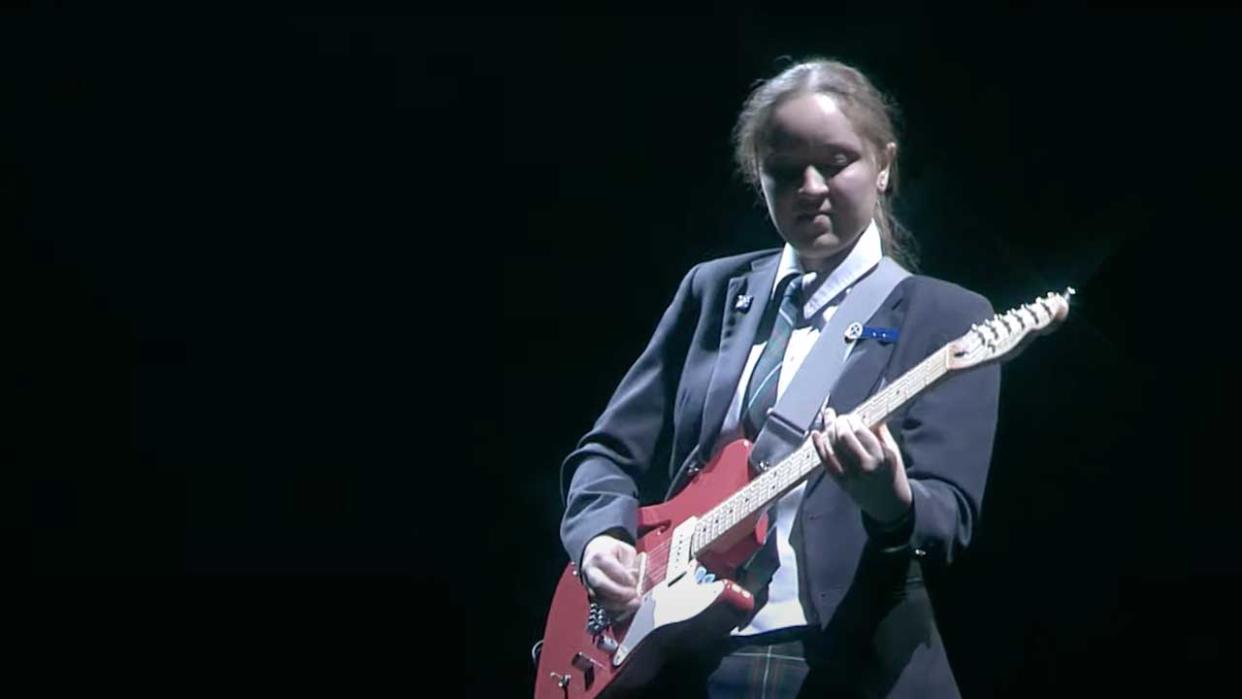  Guitarist Mia Fraser onstage. 