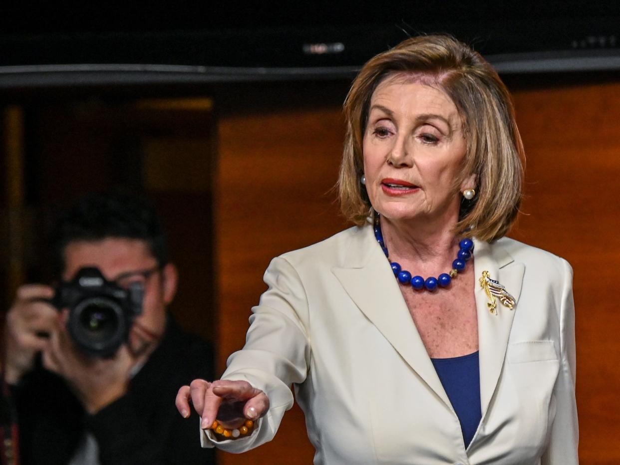 U.S. House Speaker Nancy Pelosi (D-CA) takes questions on the status of the House impeachment inquiry of U.S. President Donald Trump during her weekly news conference on Capitol Hill in Washington, U.S., December 5, 2019. REUTERS/Erin Scott