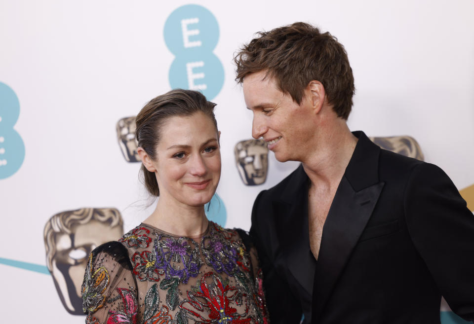 Eddie Redmayne, right, and Hannah Bagshawe pose for photographers upon arrival at the 76th British Academy Film Awards, BAFTA's, in London, Sunday, Feb. 19, 2023. (Photo by Vianney Le Caer/Invision/AP)