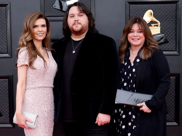 <p>Frazer Harrison/Getty</p> Andraia Allsop, Wolfgang Van Halen and Valerie Bertinelli at the 64th Annual GRAMMY Awards on April 03, 2022 in Las Vegas, Nevada.