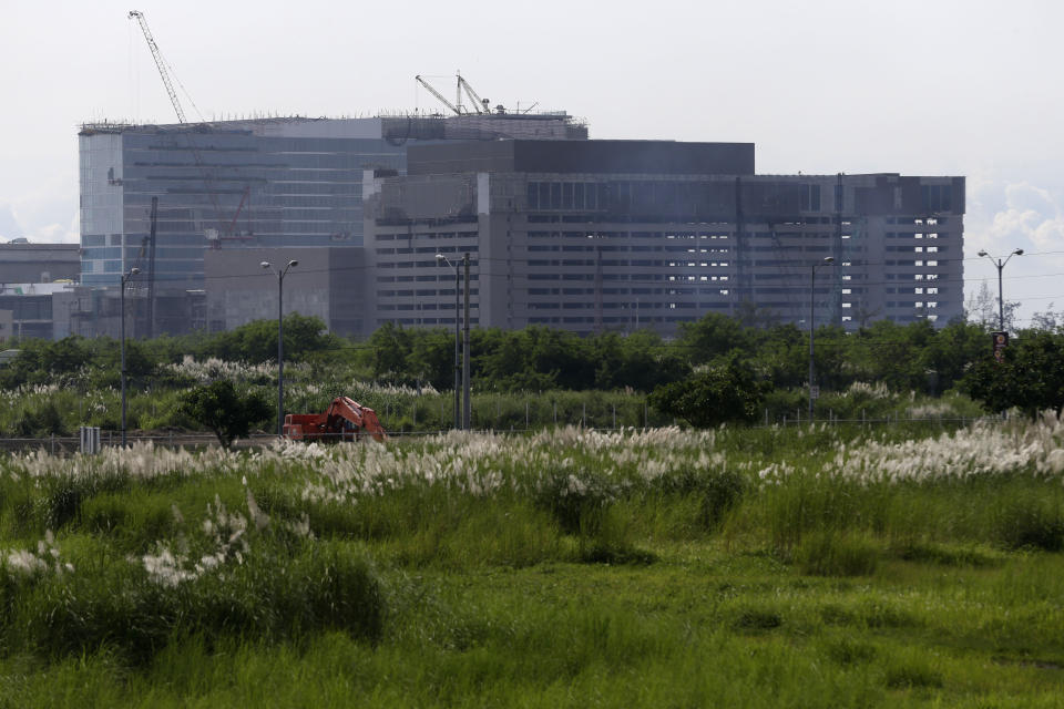 In this photo taken on Thursday, Sept. 6, 2012, construction continues to build hotels and other infrastructure in a $4-billion casino project on a reclaimed land on Manila Bay in Manila, Philippines. In South Korea, foreign investors are scheduled to break ground next year on a clutch of casino resorts offshore. The projects are part of a casino building boom rolling across Asia, where governments are trying to develop their tourism markets to capture increasingly affluent Asians with a penchant for gambling. (AP Photo/Bullit Marquez)