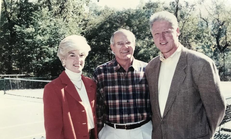 From left to right, Gail and Johnny O'Brien stand alongside President Bill Clinton circa October 1998 near the O'Brien's tennis guest cottage, which was used as a locale for Middle East Peace talks that Clinton led at the adjacent Aspen Wye River Conference Centers near Queenstown, Maryland. The president bought his dog, a chocolate lab and Eastern Shore native named Buddy and the O’Brien dog, a mutt named Jasper, Mr. O'Brien said, “kind of snubbed” the presidential pooch.