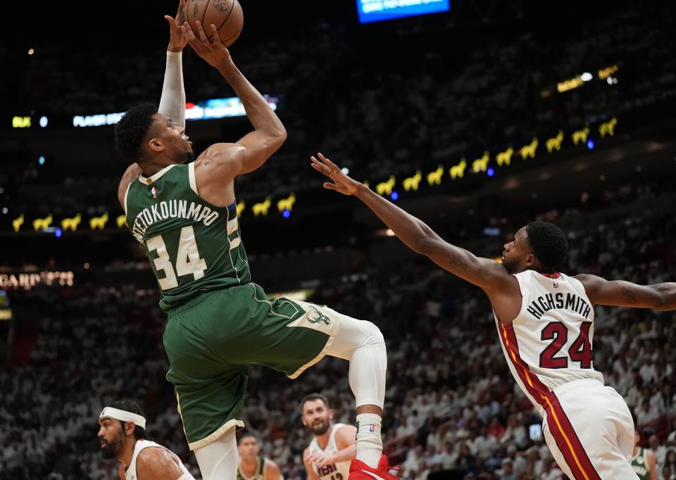 Bucks forward Giannis Antetokounmpo takes a shot over Heat forward Haywood Highsmith in the first quarter of Game 4 of their opening round playoff series Monday night in Miami.
