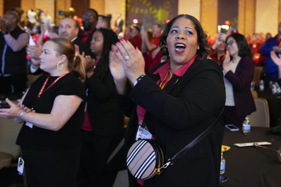 UAW members applaud as Shawn Fain, President of the United Auto Workers speaks prior to President Joe Biden speaking to a United Auto Workers' political convention, Wednesday, Jan. 24, 2024, in Washington. (AP Photo/Alex Brandon)