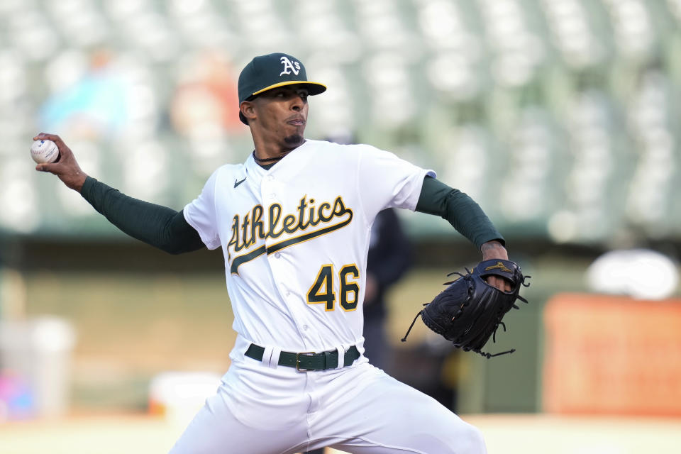 Oakland Athletics pitcher Luis Medina throws to a Texas Rangers batter during the first inning of a baseball game in Oakland, Calif., Thursday, May 11, 2023. (AP Photo/Godofredo A. Vásquez)