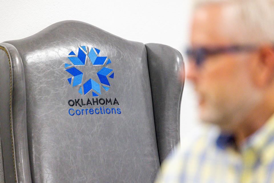 The Hot Seat.  A chair with the Department of Corrections logo sits in the office of Director Steven Harpe, chosen by Gov. Kevin Stitt to reform an agency under fire from inmates and employees.