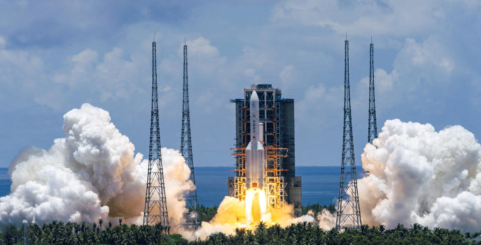 A Long March-5 rocket carrying the Tianwen-1 Mars probe lifts off from the Wenchang Space Launch Centre in southern China's Hainan Province