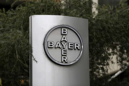 The corporate logo of Bayer is seen at the headquarters building in Caracas March 1, 2016. Picture taken March 1, 2016. REUTERS/Marco Bello/File Photo T