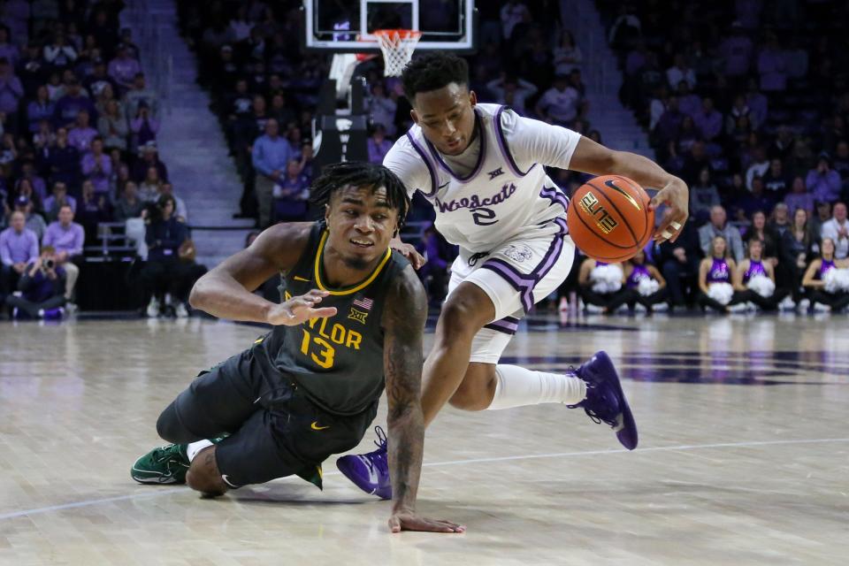 Kansas State guard Tylor Perry (2) steals the ball from Baylor's Langston Love (13) during overtime Tuesday at Bramlage Coliseum. Perry had 18 points and four steals in the Wildcats' 68-64 victory.