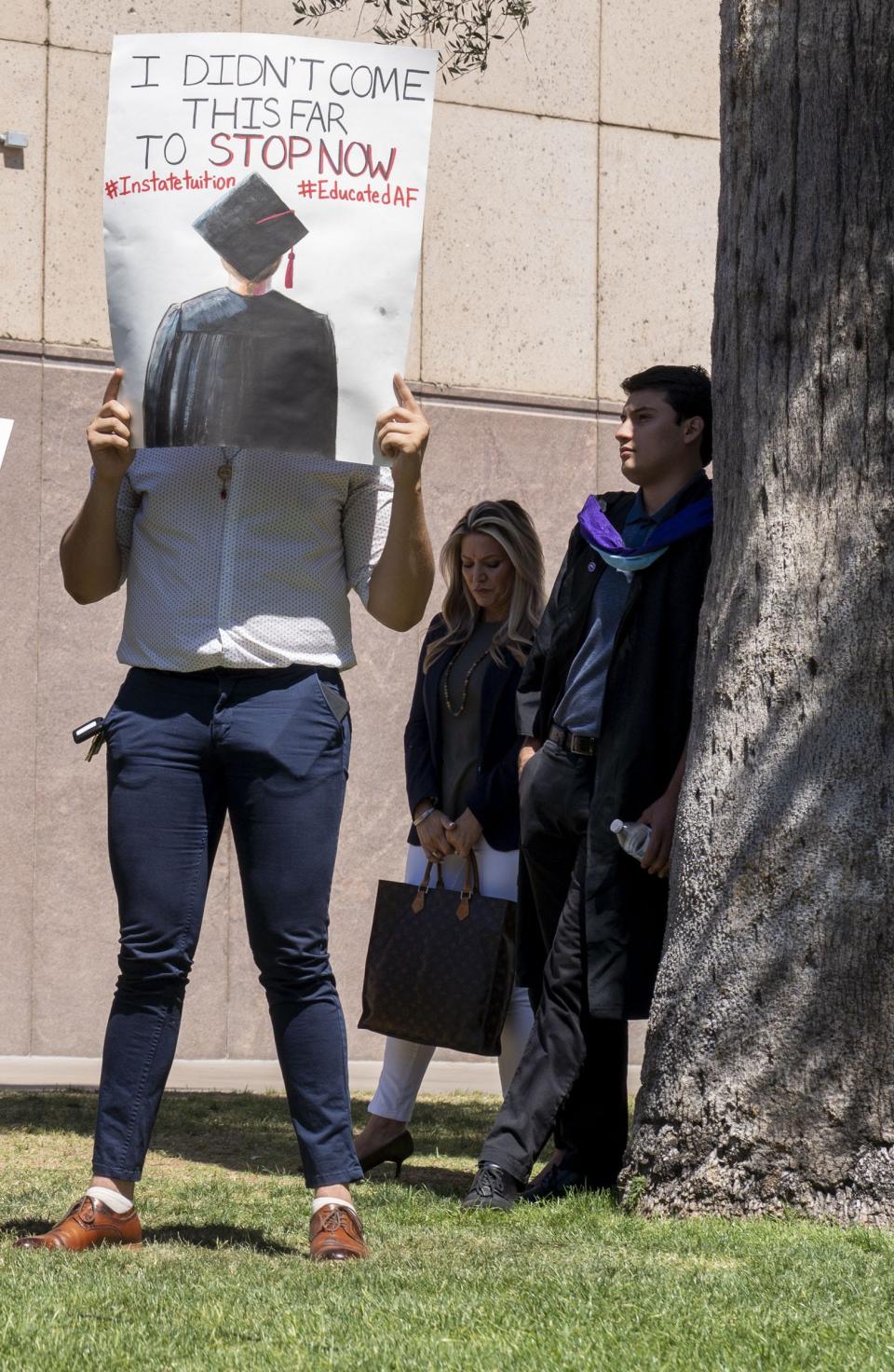 "Dreamers" and student supporters rally at the Arizona state Capitol, asking legislators to support "Dreamers" so they can be eligible for in-state tuition and merit-based scholarships.