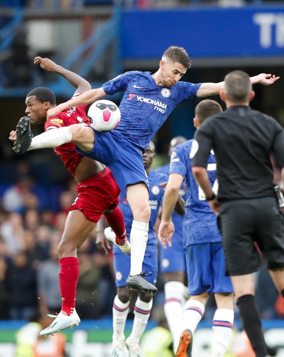 Chelsea's Jorginho goes for the ball during the British Premier League soccer match between Chelsea and Liverpool, at the Stamford Bridge Stadium, London, Sunday, Sept. 22, 2019. (AP Photo/Frank Augstein)