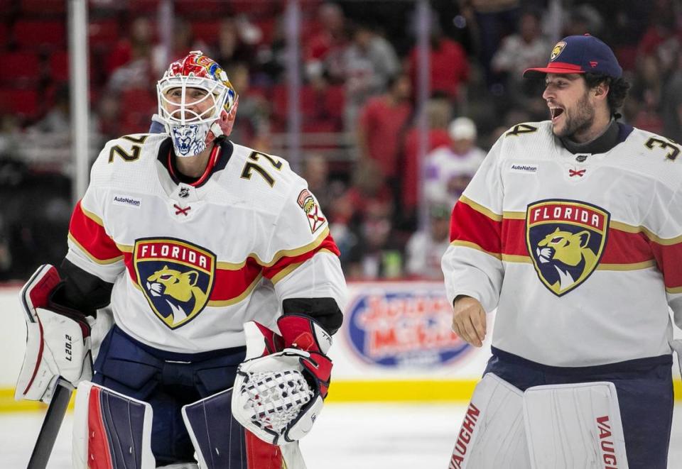 Florida Panthers goalie Sergei Bobrovsky (72) skates off the ice with goalie Alex Lyon (34) following their 2-1 overtime victory against the Carolina Hurricanes in Game 2 of the Eastern Conference Finals on Saturday, May 20, 2023 at PNC Arena in Raleigh, N.C. Bobrovsky made 37 saves in the victory.