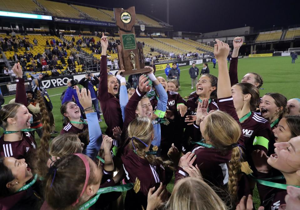 The Walsh Jesuit girls soccer team celebrates after beating Olentangy Liberty in the OHSAA Division I girls state soccer championship game at Historic Crew Stadium, Friday, Nov. 10, 2023.