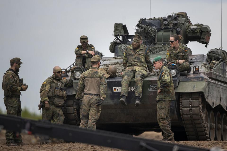 German soldiers hanging out on a tank