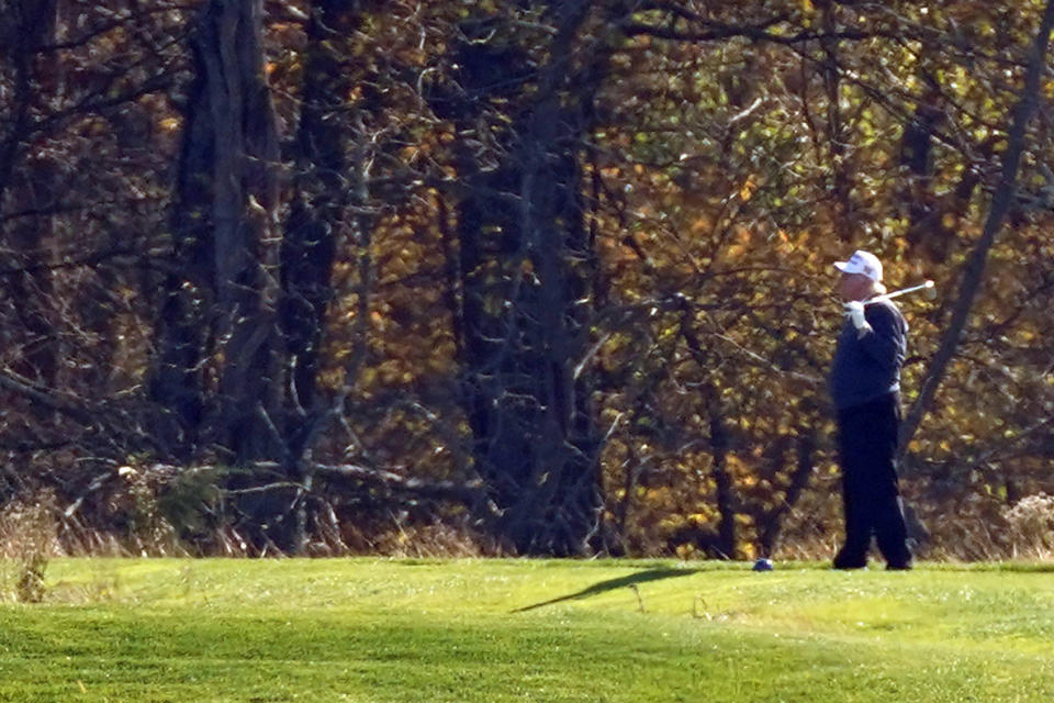 President Donald Trump plays a round of Golf at the Trump National Golf Club in Sterling Va., Sunday Nov. 8, 2020. (AP Photo/Steve Helber)