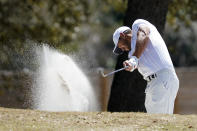 Brooks Koepka hits out of a bunker on the sixth fairway in the second round of the Dell Technologies Match Play Championship golf tournament, Thursday, March 24, 2022, in Austin, Texas. (AP Photo/Tony Gutierrez)