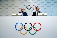 International Olympic Committee (IOC) President Thomas Bach gives a news conference with Mark Adams, IOC Chief of Communications, after the Olympic Summit on doping in Lausanne, Switzerland, June 21, 2016. REUTERS/Denis Balibouse