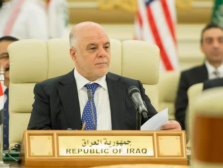 Iraqi Prime Minister Haider Al-Abadi attends a meeting with Saudi Arabia's King Salman bin Abdulaziz Al Saud and U.S. Secretary of State Rex Tillerson in Riyadh, Saudi Arabia October 22, 2017. Saudi Press Agency/Handout via REUTERS