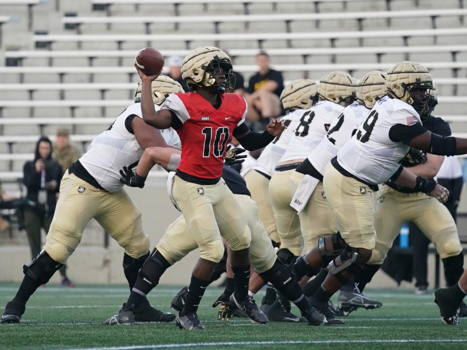 Army quarterback Dewayne Coleman (10) fires a pass during a spring scrimmage at Michie Stadium at West Point on Friday, April 21, 2023.