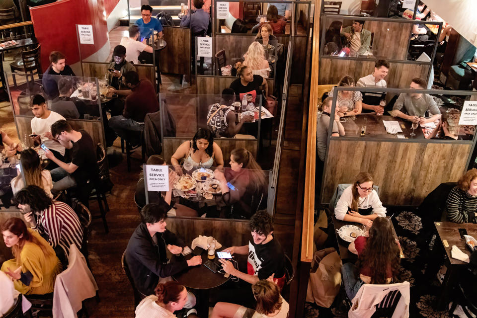 LONDON, UNITED KINGDOM - 2021/05/27: Transparent partitions used to preserve social distance seen inside a bar in soho area. (Photo by May James/SOPA Images/LightRocket via Getty Images)