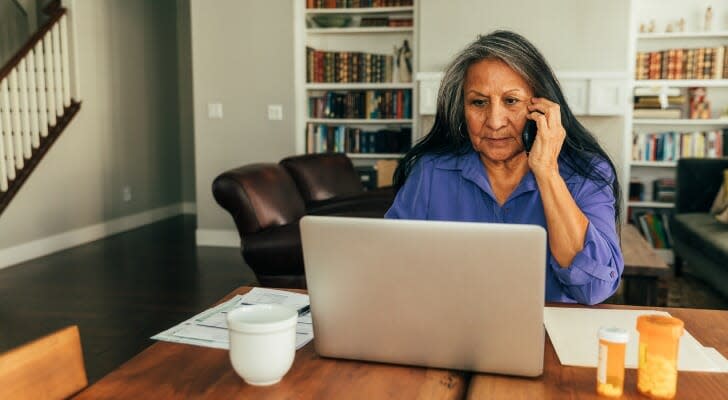 Senior woman talking to a Social Security official