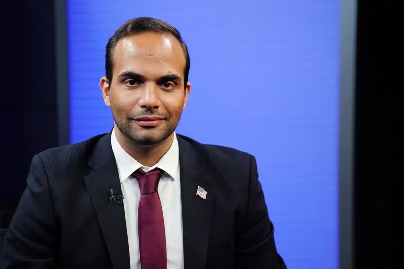 FILE PHOTO: George Papadopoulos, a former member of the foreign policy panel to Donald Trump's 2016 presidential campaign, poses for a photo before a TV interview in New York