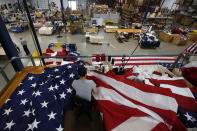 <p>A worker sews an American flag at the FlagSource facility in Batavia, Illinois, U.S., on Tuesday, June 27, 2017. (Photo: Jim Young/Bloomberg via Getty Images) </p>