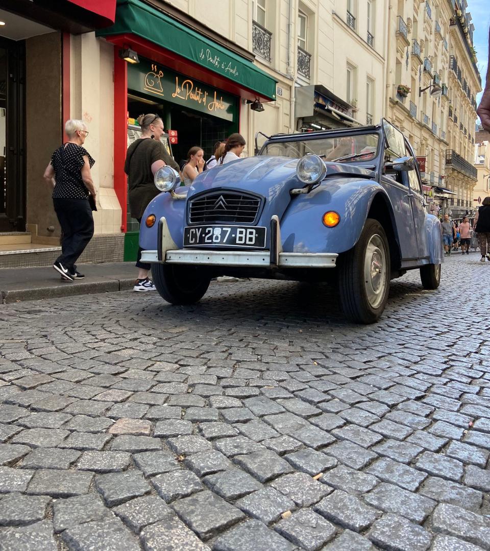 A classic Citroen 2CV could be rented to enjoy the cobblestone roads in Monmartre, France