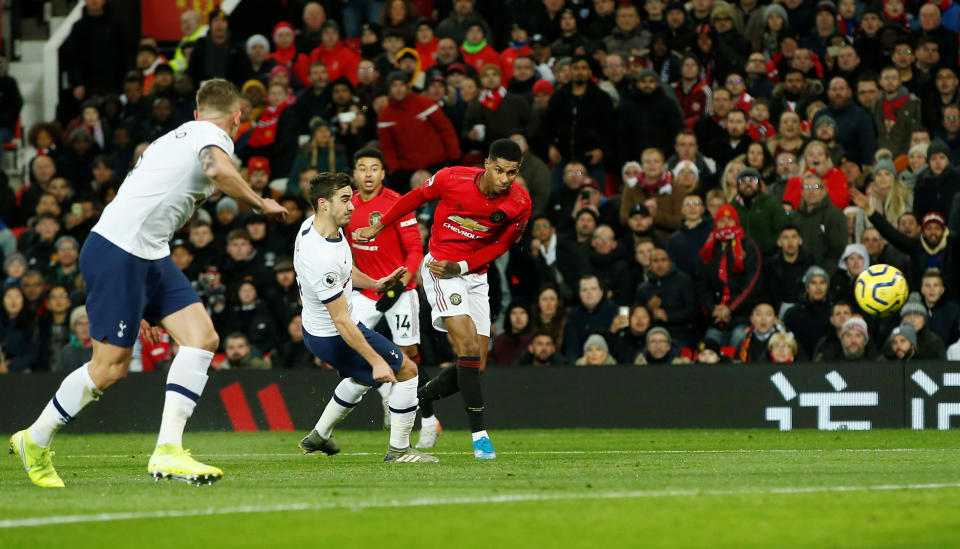 Soccer Football - Premier League - Manchester United v Tottenham Hotspur - Old Trafford, Manchester, Britain - December 4, 2019  Manchester United's Marcus Rashford scores their first goal   REUTERS/Andrew Yates  EDITORIAL USE ONLY. No use with unauthorized audio, video, data, fixture lists, club/league logos or "live" services. Online in-match use limited to 75 images, no video emulation. No use in betting, games or single club/league/player publications.  Please contact your account representative for further details.