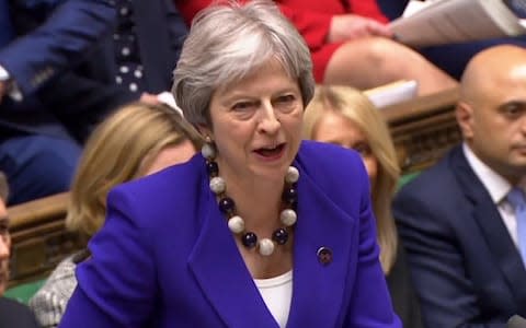 Mrs May told the commons the decision to destroy the landing cards of Windrush migrants was taken under a Labour Government in 2009 - Credit: TOLGA AKMEN /AFP