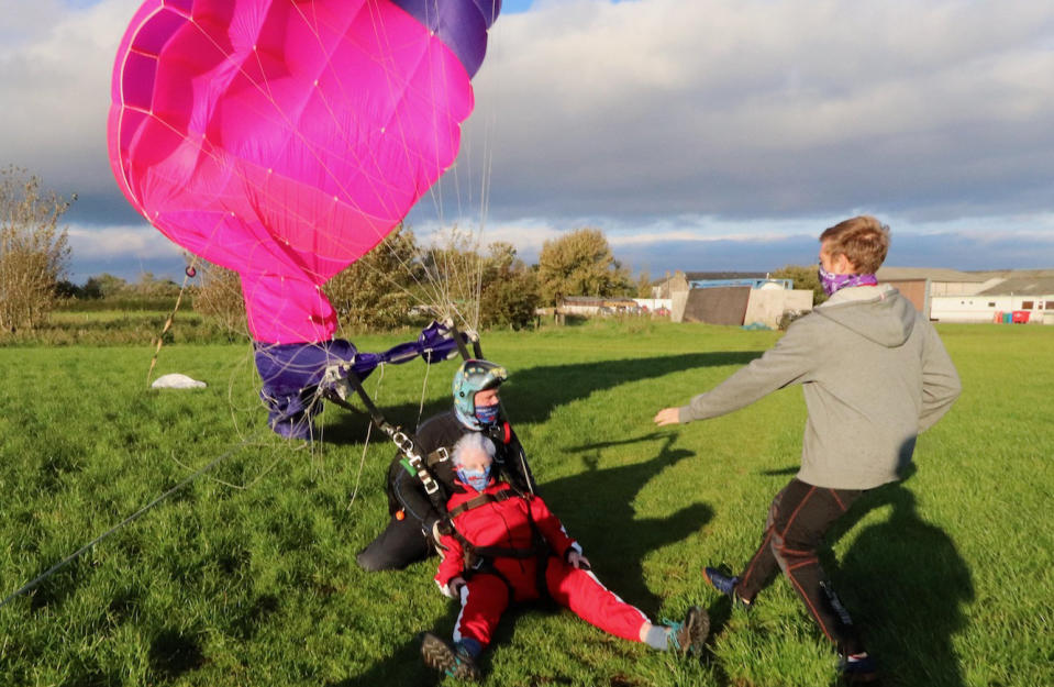 A thrill seeking great-gran has celebrated her 90th birthday - by taking to the air and SKYDIVING from 15,000 feet. Sprightly Patricia Baker said it felt "awesome" to plunge from a whopping three miles up in testing conditions. Brilliant photos and videos show the widowed gran-of-ten dressed in a red jumpsuit flying through the sky. Patricia said she "wasn't too worried" about the jump because she "keeps herself fit" by doing 50 sit ups every morning. And her main motivation was to raise some money for charity, she added.