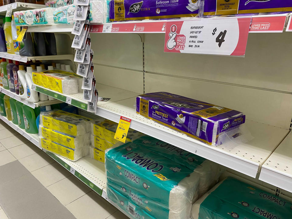 Shelves with reduced stocks of toilet paper are seen at a supermarket in Singapore, Friday, May 14, 2021. Singapore further tightened its COVID-19 measures as it sought to control an increase in untraceable coronavirus infections in the city-state. (AP Photo/Zen Soo)