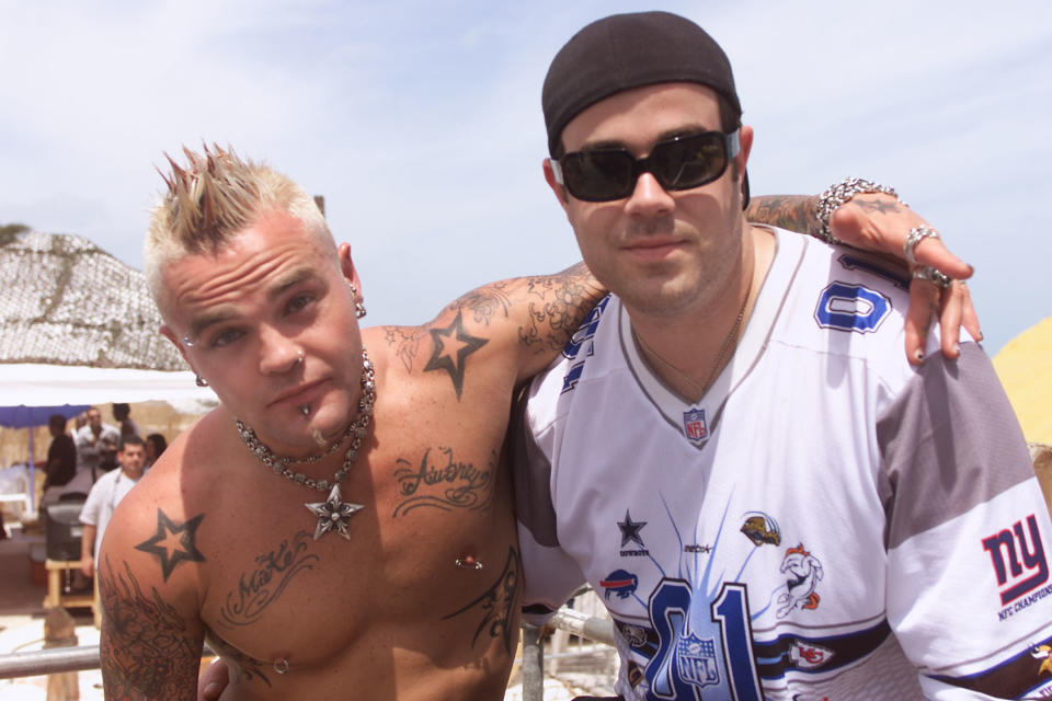 Lead singer of Crazy Town Shifty Shellshock, on left, with TRL host Carson Daly backstage during MTV's Spring Break 2001 in Cancun, Mexico.