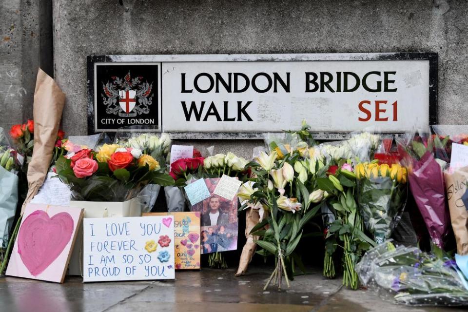 Flowers and messages of condolence near the scene of Jack Merritt’s murder.