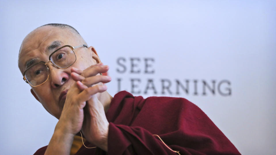 Tibetan spiritual leader the Dalai Lama listens to a question during a press conference after talking to an audience of educators, in New Delhi, India, Thursday, April 4, 2019. The Dalai Lama says he has been seeking a mutually acceptable solution to the Tibetan issue with China since 1974 but that Beijing considers him a "splittist."(AP Photo/Manish Swarup)