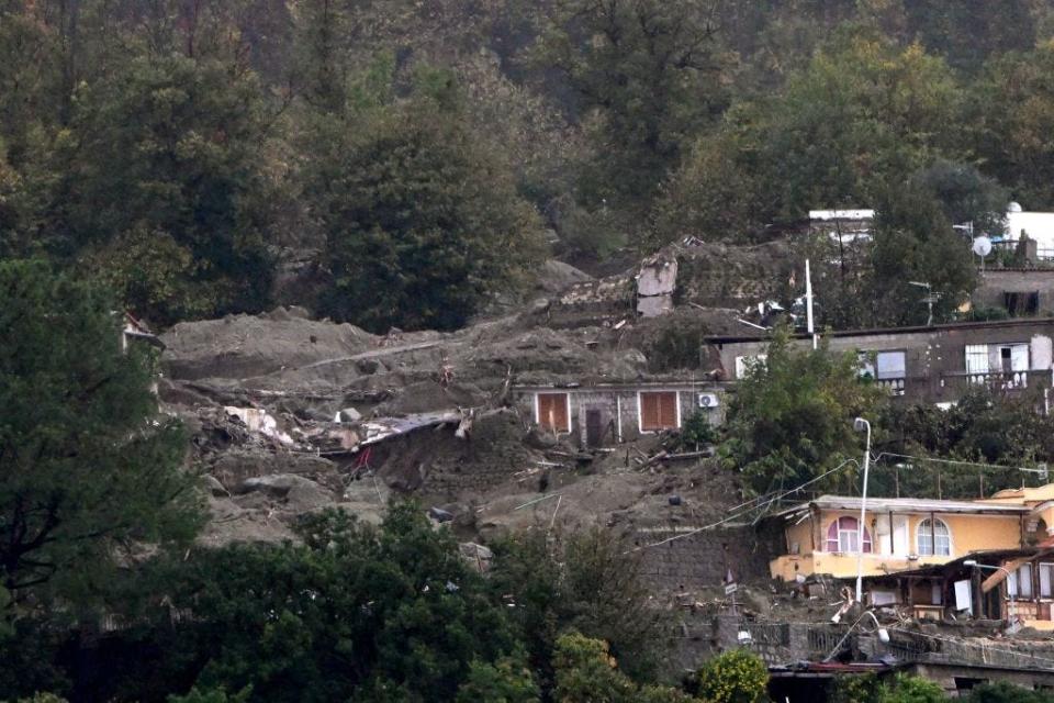 This photograph taken on November 26, 2022 shows damaged buildings following a landslide caused by heavy rains in Casamicciola on the island of Ischia.