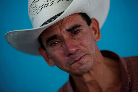 Jose Guardado, 42, a deportee from the US and separated from his son Nixon Guardado, 12 at the McAllen entry point under the Trumps administration hard line immigration policy, gestures during an interview with Reuters at his home in Eden, Lepaera, Honduras June 23, 2018. REUTERS/Carlos Jasso